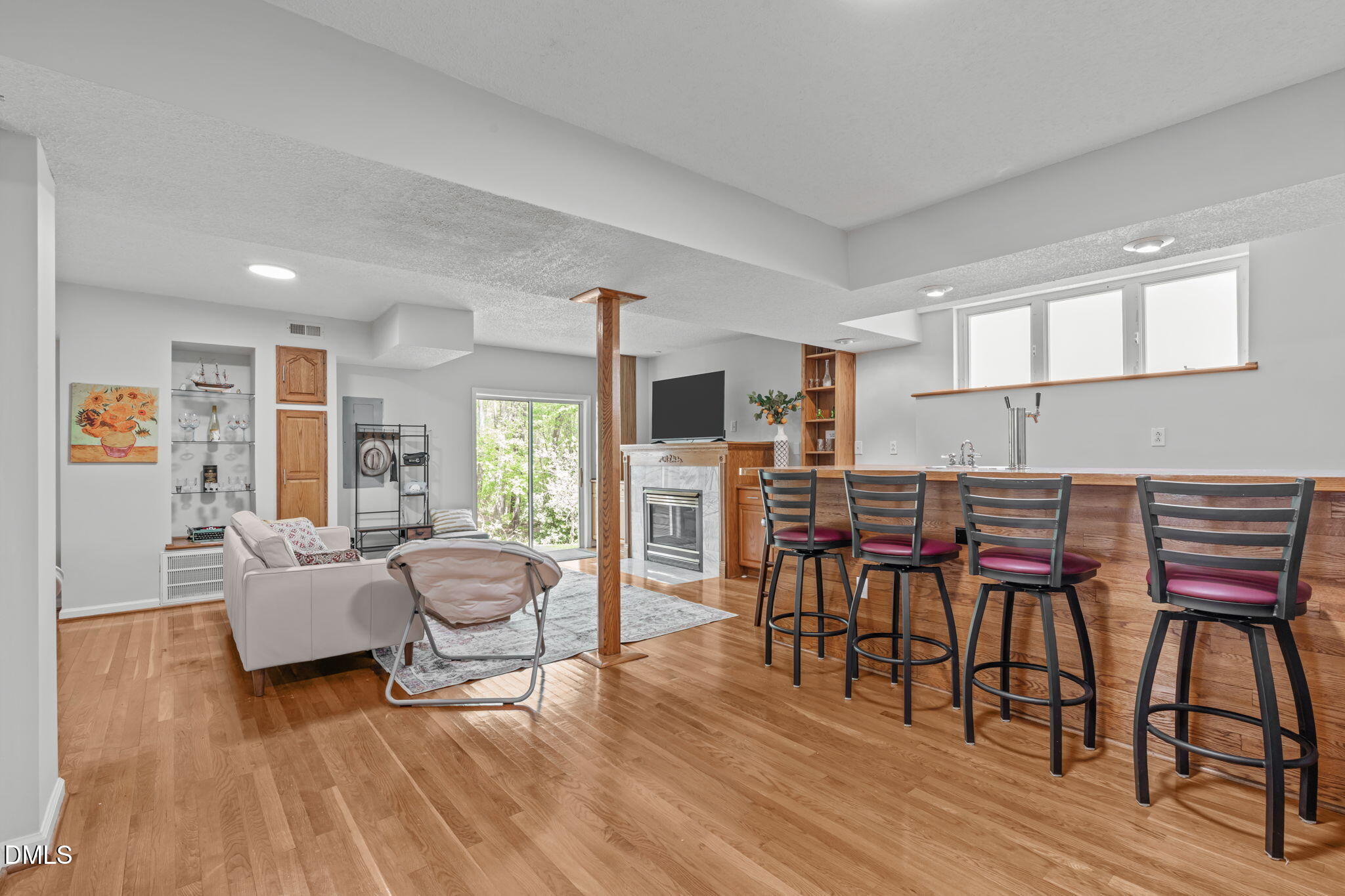 104 Lost Tree Lane Cary, NC 27513 - Photo 34 of 54 a living room with furniture and wooden floor