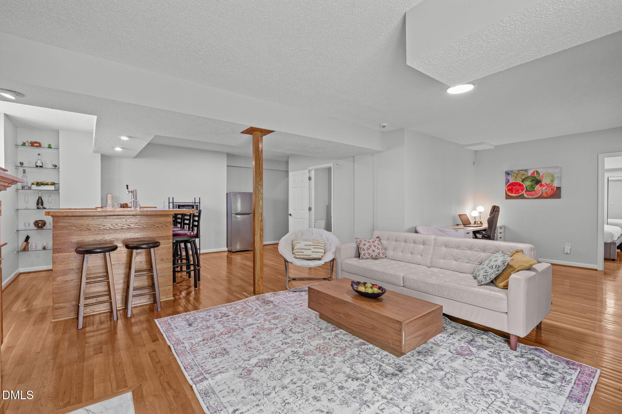 104 Lost Tree Lane Cary, NC 27513 - Photo 37 of 54 a living room with furniture and a wooden floor