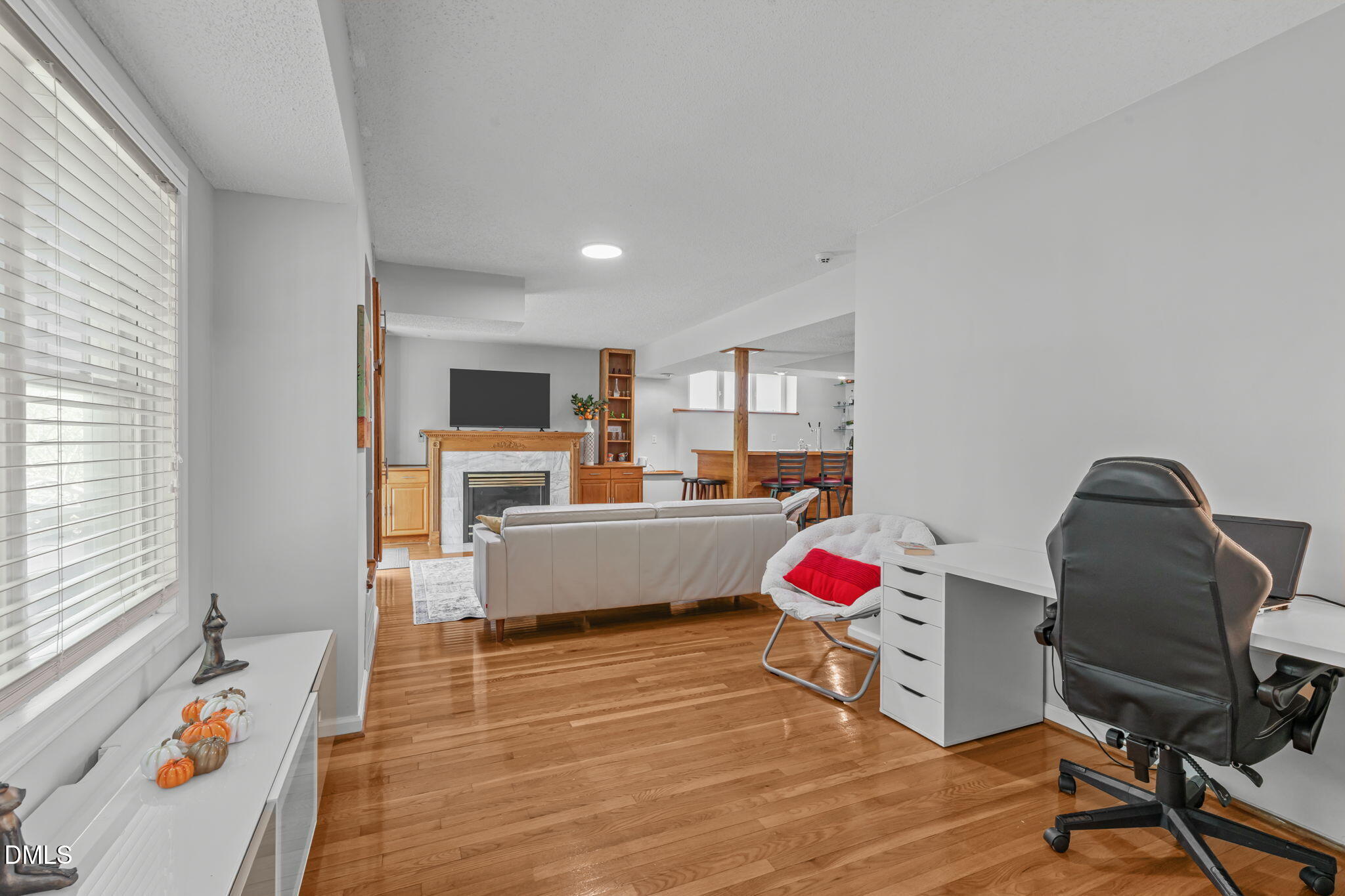 104 Lost Tree Lane Cary, NC 27513 - Photo 41 of 54 a living room with furniture and wooden floor