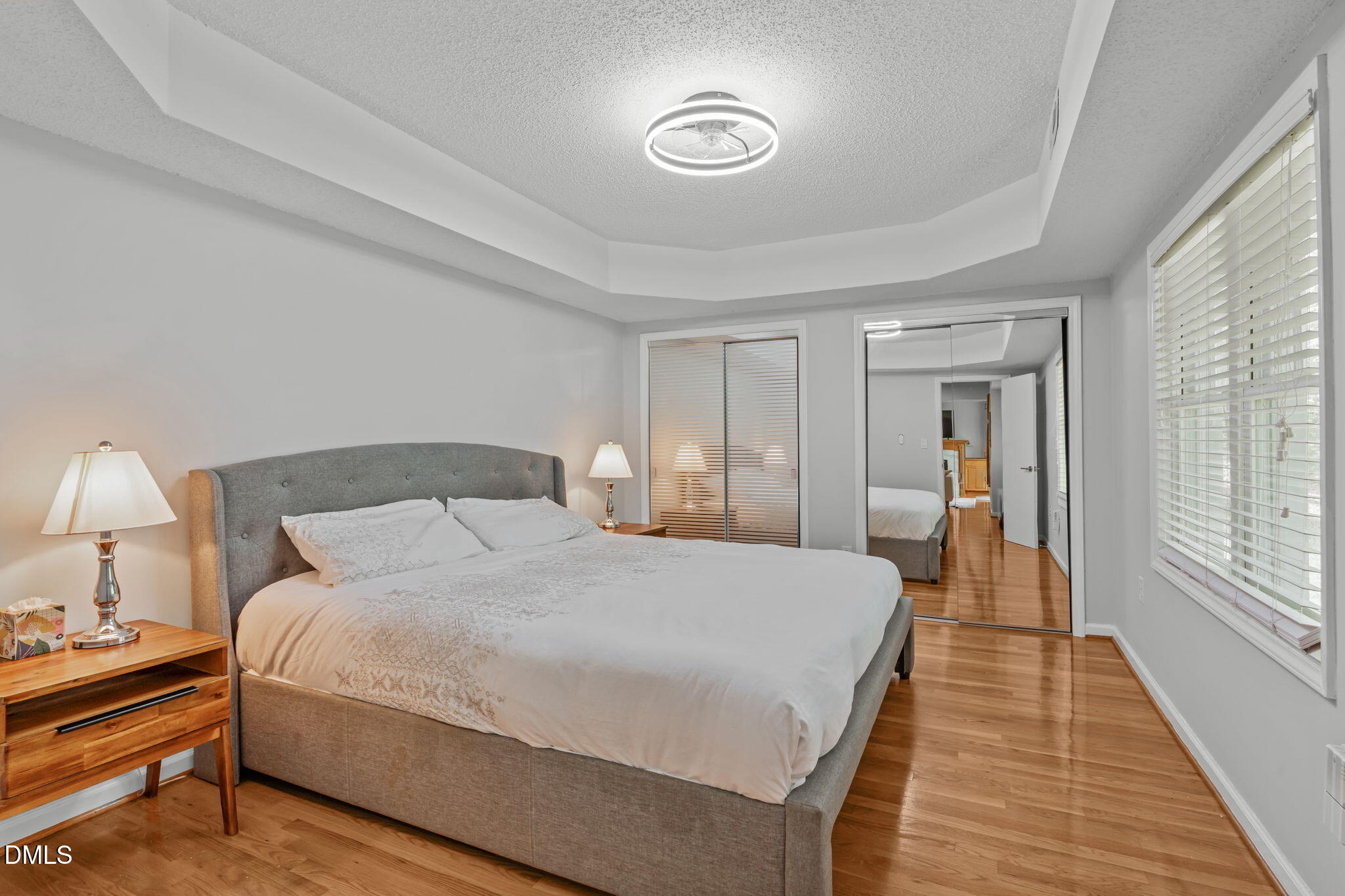 104 Lost Tree Lane Cary, NC 27513 - Photo 42 of 54 a bedroom with bed and window