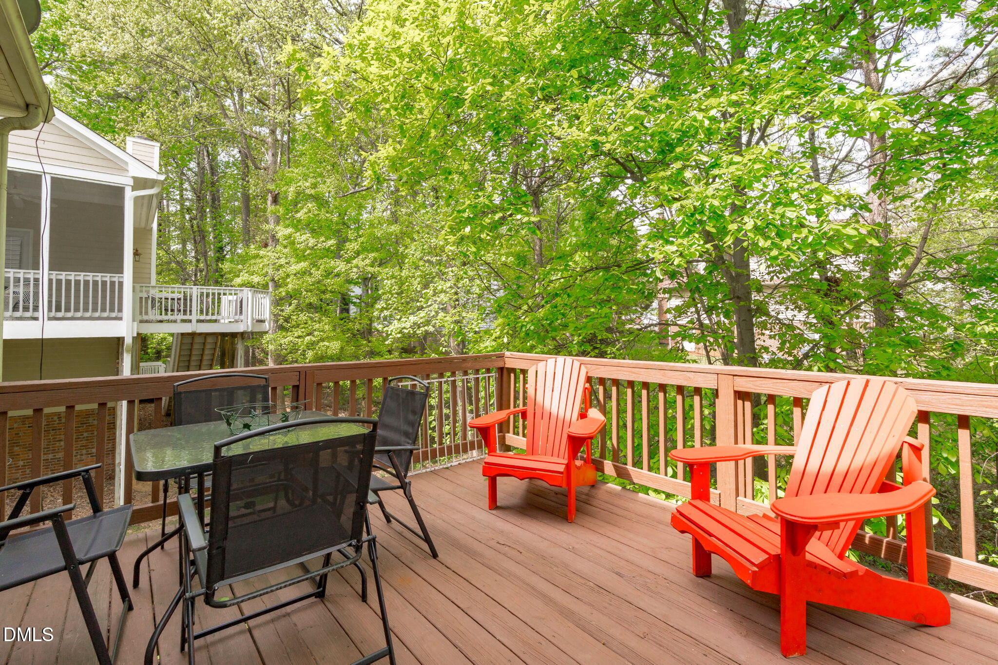 104 Lost Tree Lane Cary, NC 27513 - Photo 43 of 54 a view of a chair and table on the wooden deck