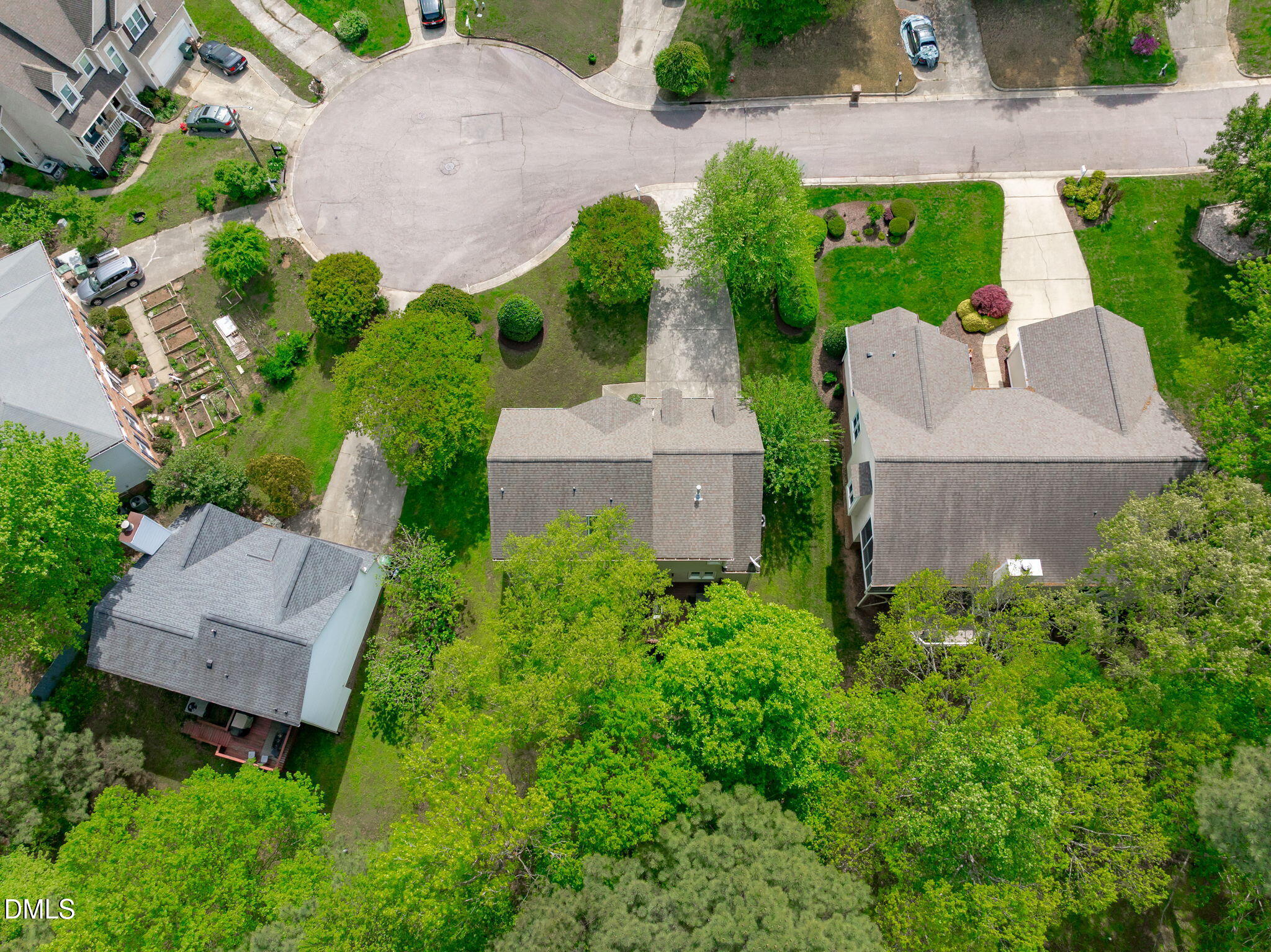 104 Lost Tree Lane Cary, NC 27513 - Photo 52 of 54 an aerial view of a house with garden space and street view