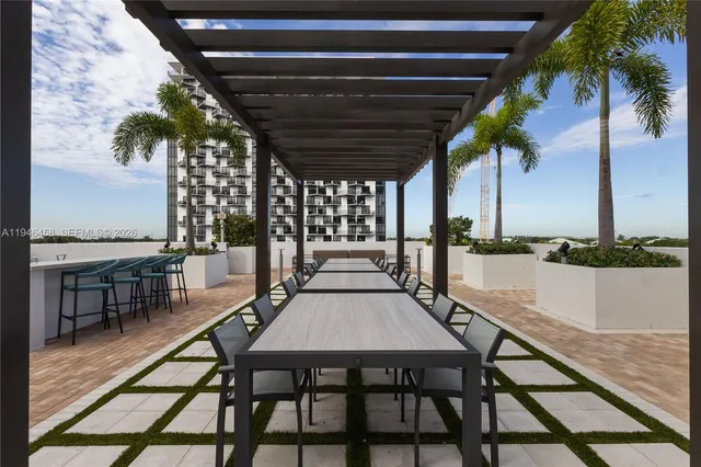 a view of a swimming pool with a yard