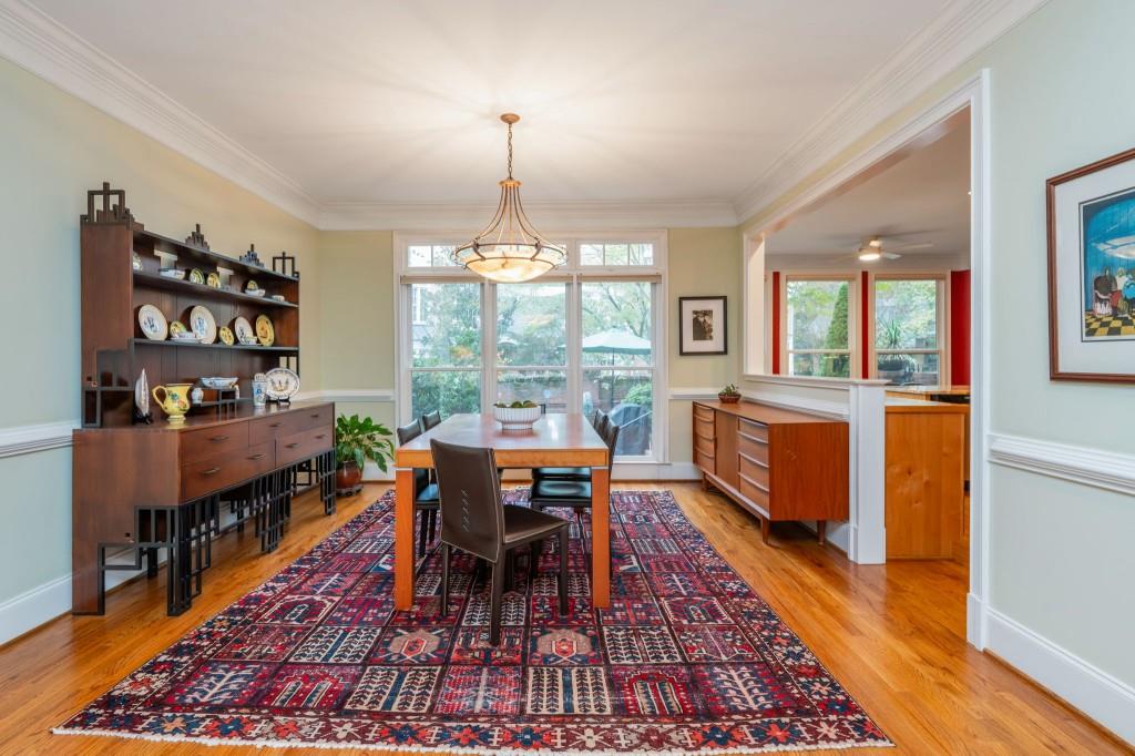 676 Clifton Road Northeast Atlanta, GA 30307 - Photo 11 of 45 a view of a dining room with furniture window and wooden floor