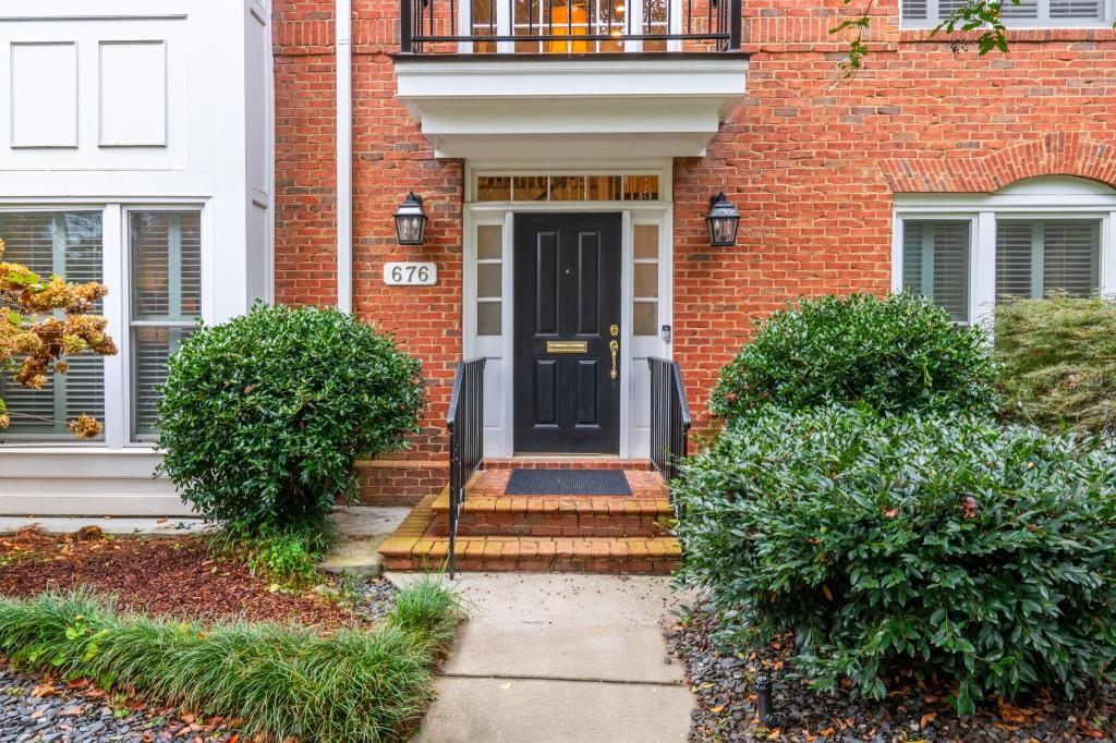 676 Clifton Road Northeast Atlanta, GA 30307 - Photo 2 of 45 a front view of a house with garden