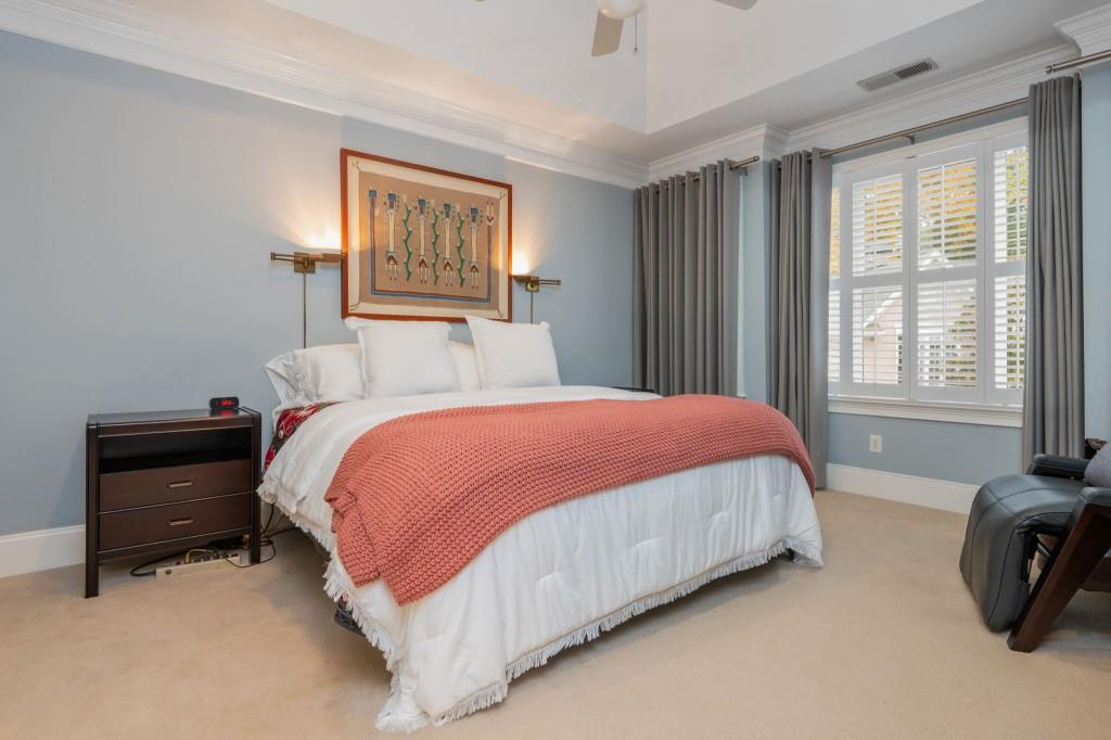 676 Clifton Road Northeast Atlanta, GA 30307 - Photo 27 of 45 a bedroom with a bed and a window