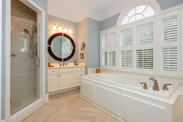 a bathroom with a sink a toilet and a tub