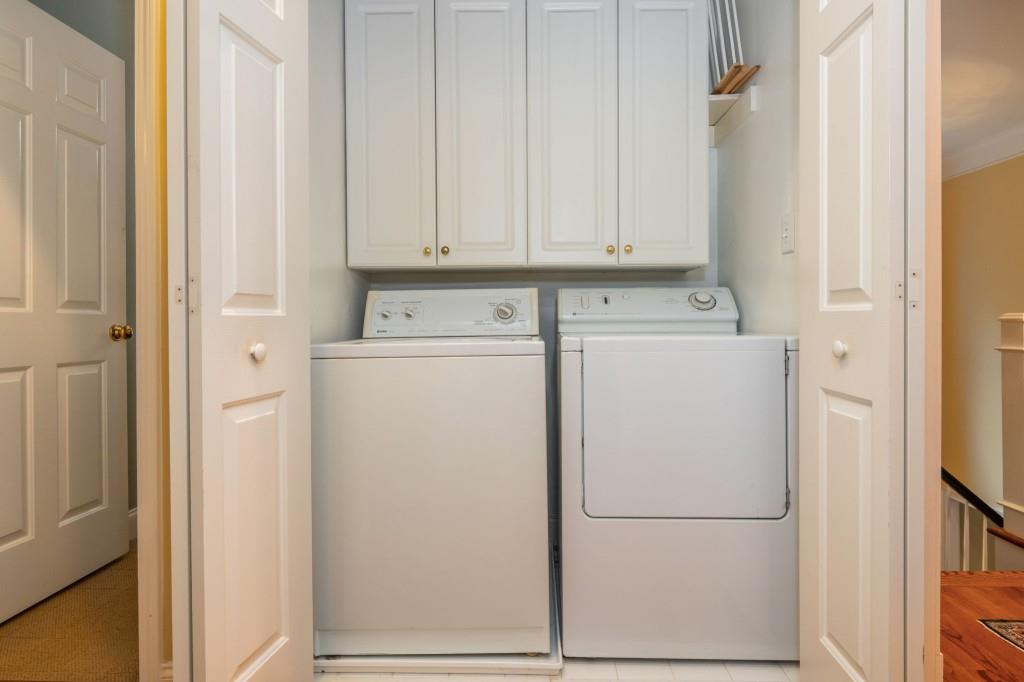 676 Clifton Road Northeast Atlanta, GA 30307 - Photo 34 of 45 a utility room with dryer and washer