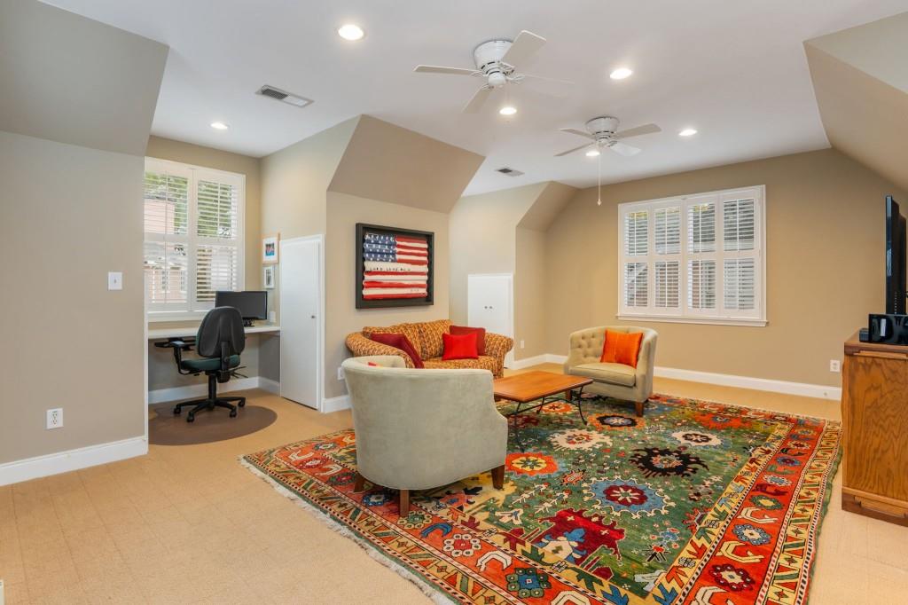676 Clifton Road Northeast Atlanta, GA 30307 - Photo 35 of 45 a living room with a couch and a table