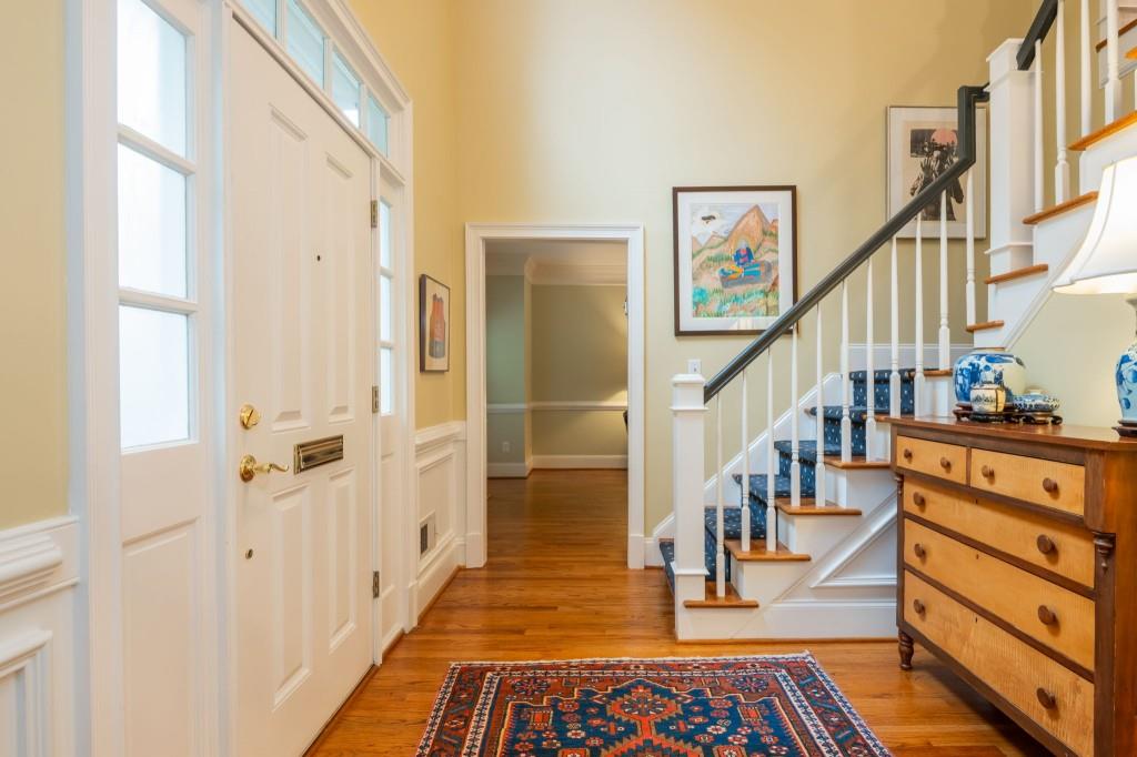 676 Clifton Road Northeast Atlanta, GA 30307 - Photo 4 of 45 a view of entryway with wooden floor and stairs