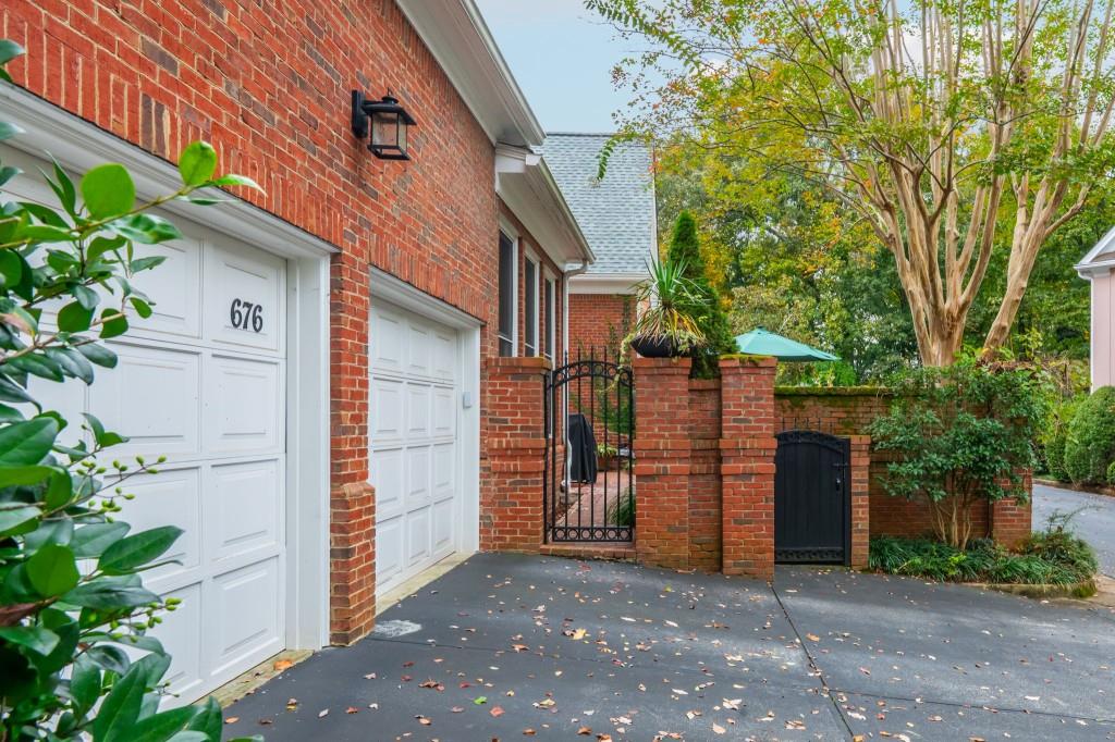 676 Clifton Road Northeast Atlanta, GA 30307 - Photo 42 of 45 a view of a house with a yard
