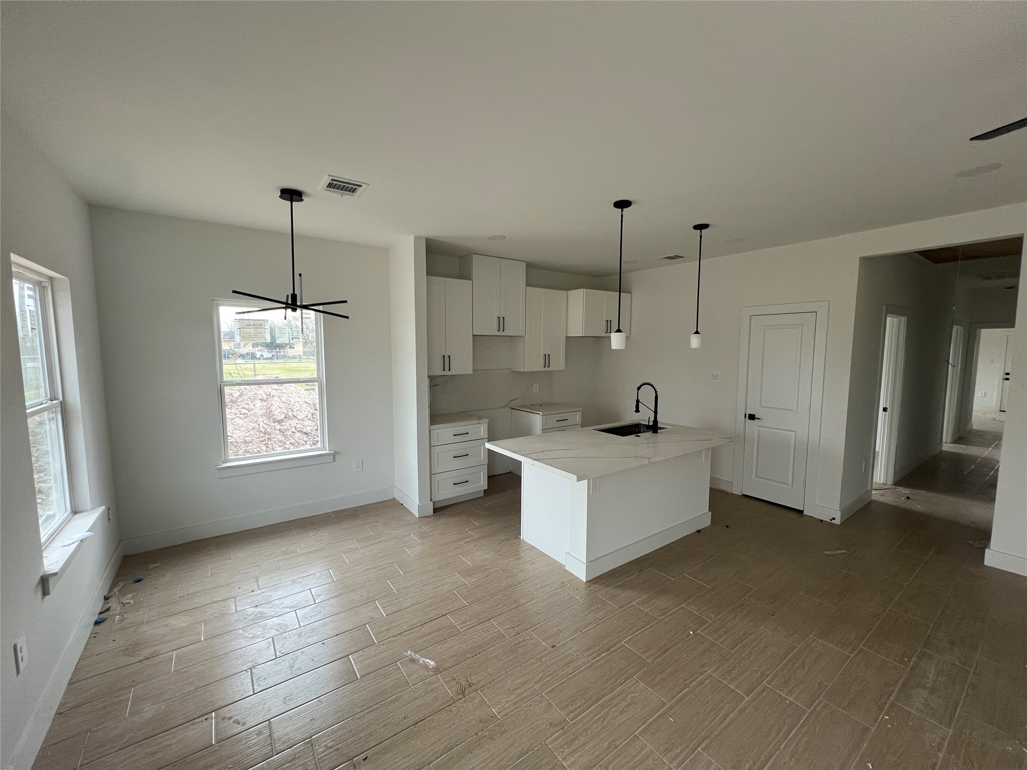 5710 Delmack Street, Unit A Houston, TX 77032 - Photo 3 of 10 a large white room with window