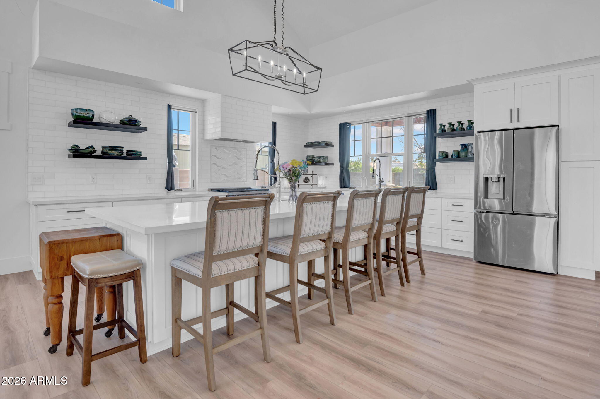 159 East Water Tank Road Gilbert, AZ 85296 - Photo 12 of 45 a view of a dining room with furniture and wooden floor