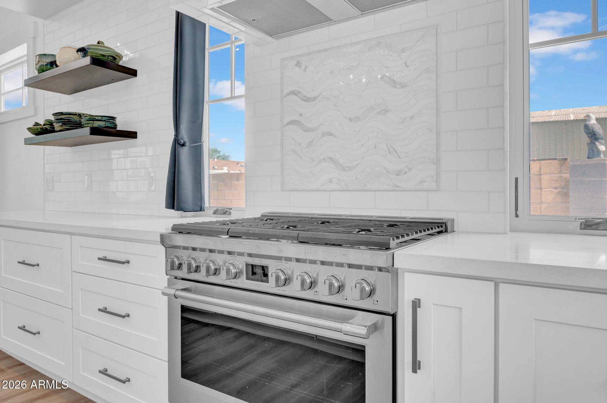 159 East Water Tank Road Gilbert, AZ 85296 - Photo 15 of 45 a stove top oven sitting inside of a kitchen