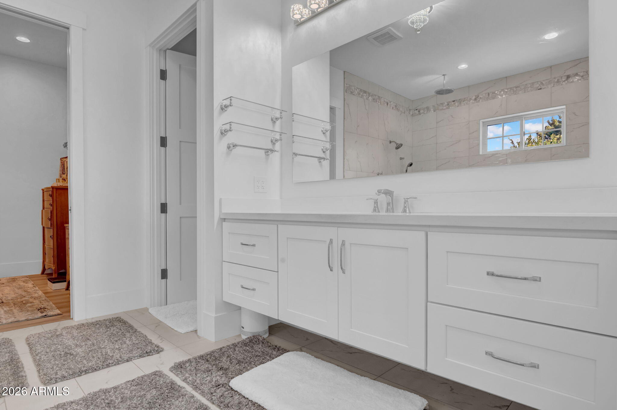 159 East Water Tank Road Gilbert, AZ 85296 - Photo 21 of 45 a bathroom with a sink and a mirror