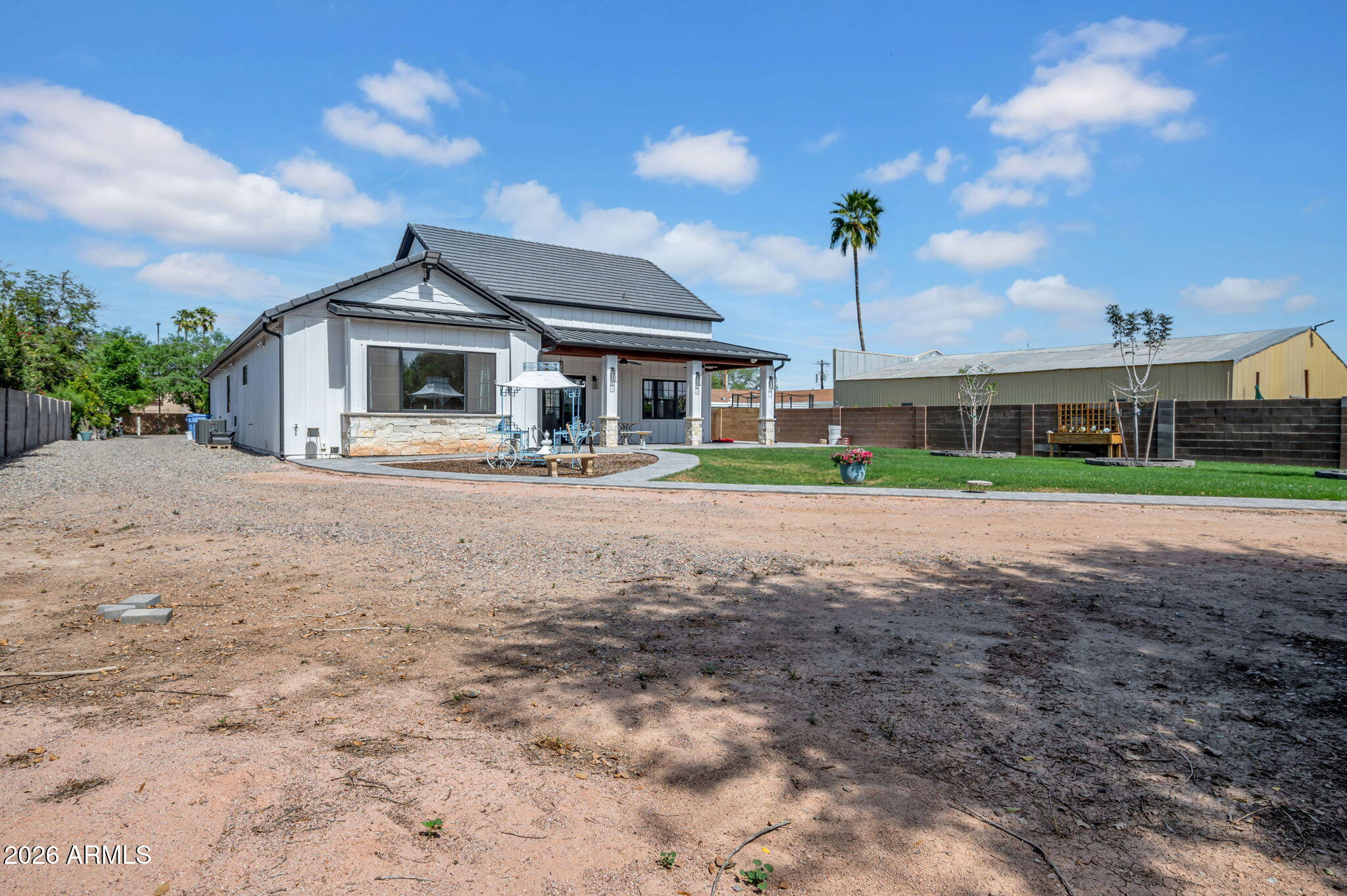 159 East Water Tank Road Gilbert, AZ 85296 - Photo 30 of 45 a front view of a house with a yard