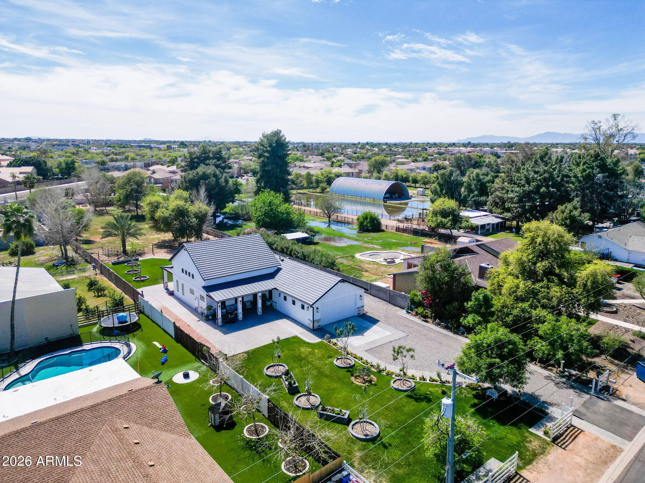 159 East Water Tank Road Gilbert, AZ 85296 - Photo 34 of 45 an aerial view of a house with garden space and street view