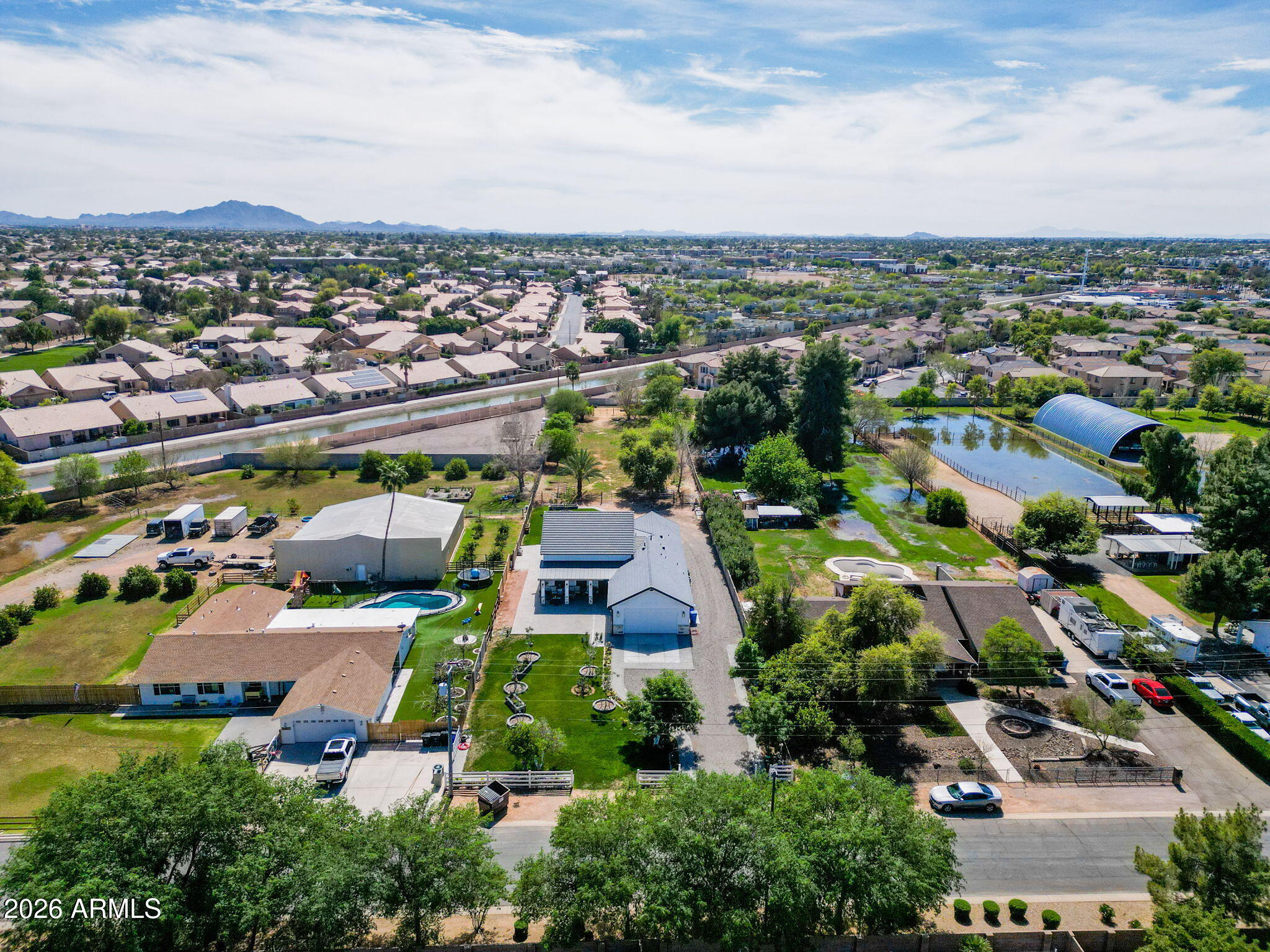 159 East Water Tank Road Gilbert, AZ 85296 - Photo 37 of 45 an aerial view of a city with lots of residential buildings