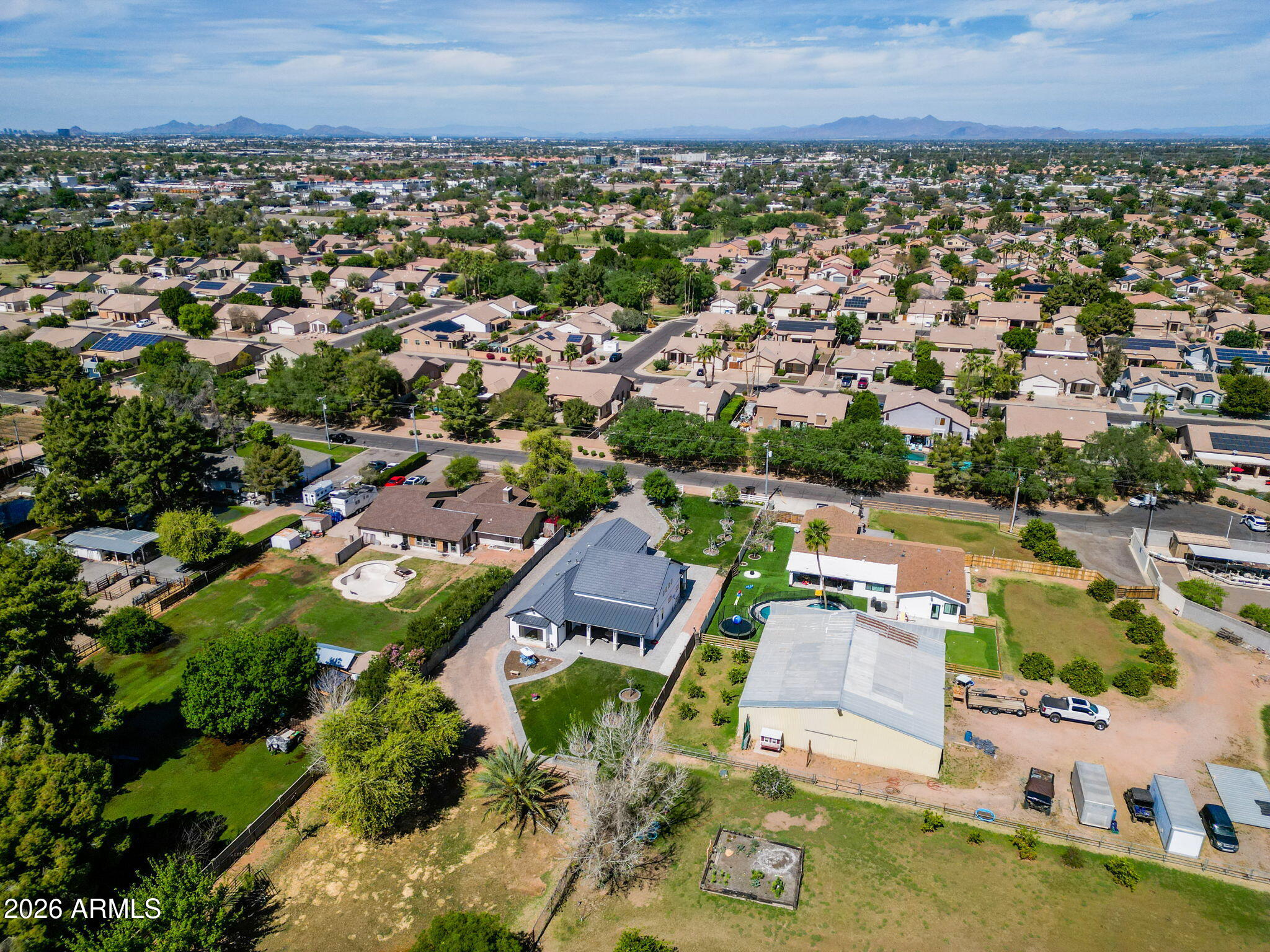 159 East Water Tank Road Gilbert, AZ 85296 - Photo 40 of 45 an aerial view of a city with lots of residential buildings