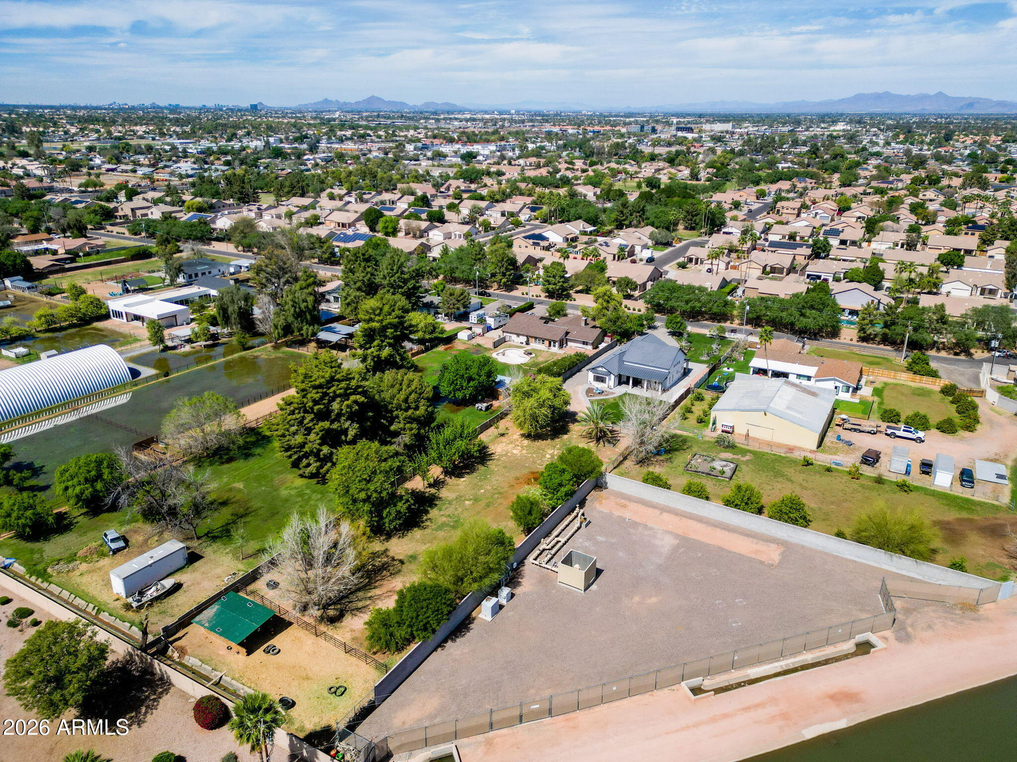 159 East Water Tank Road Gilbert, AZ 85296 - Photo 42 of 45 an aerial view of residential houses with outdoor space and trees