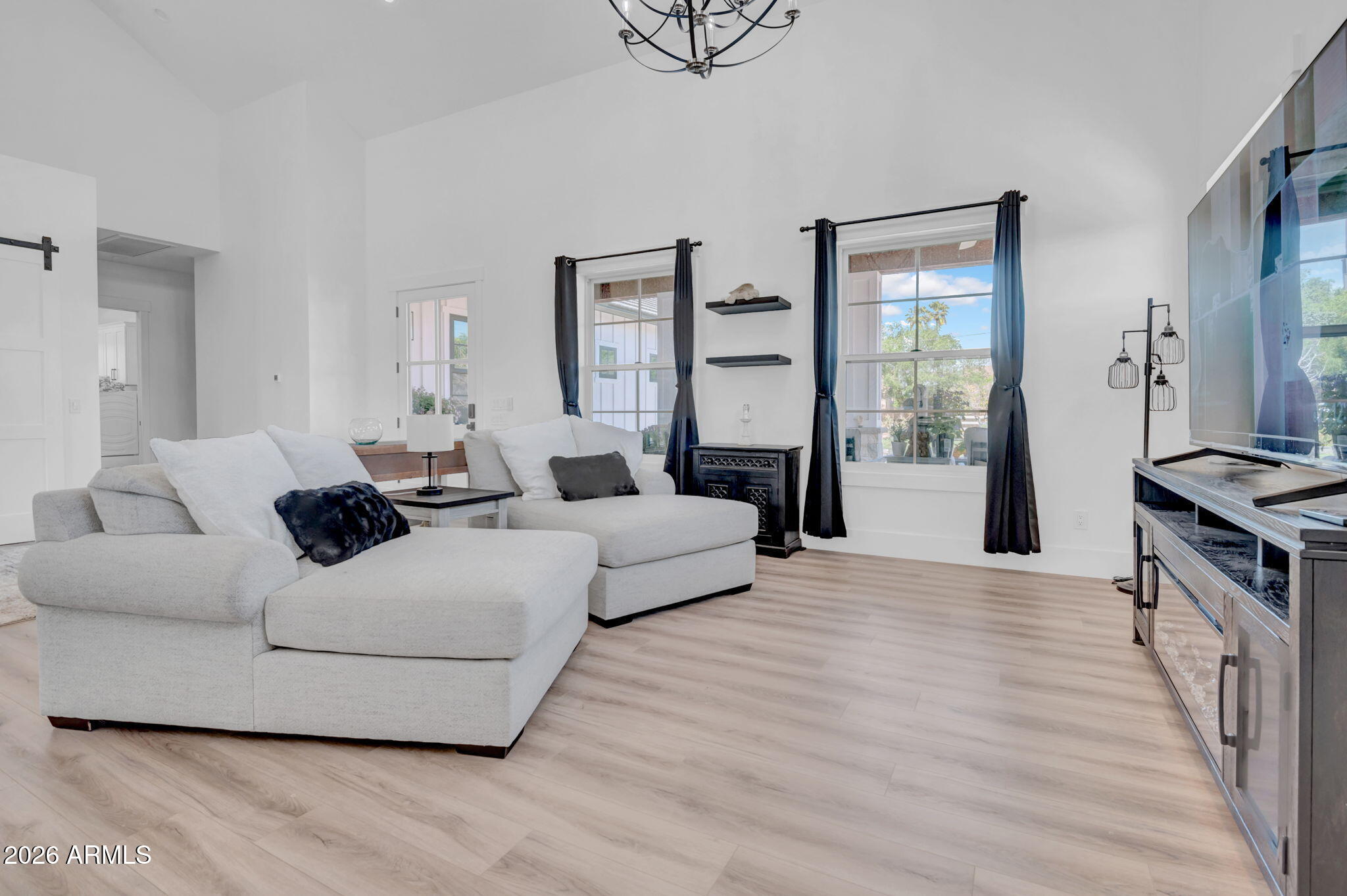 159 East Water Tank Road Gilbert, AZ 85296 - Photo 9 of 45 a living room with furniture and a table