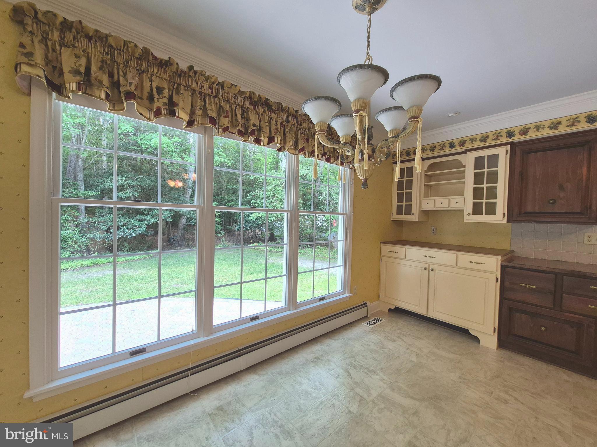 3896 5 Friars Road Salisbury, MD 21804 - Photo 17 of 60 Family meals looking onto private wooded rear yd