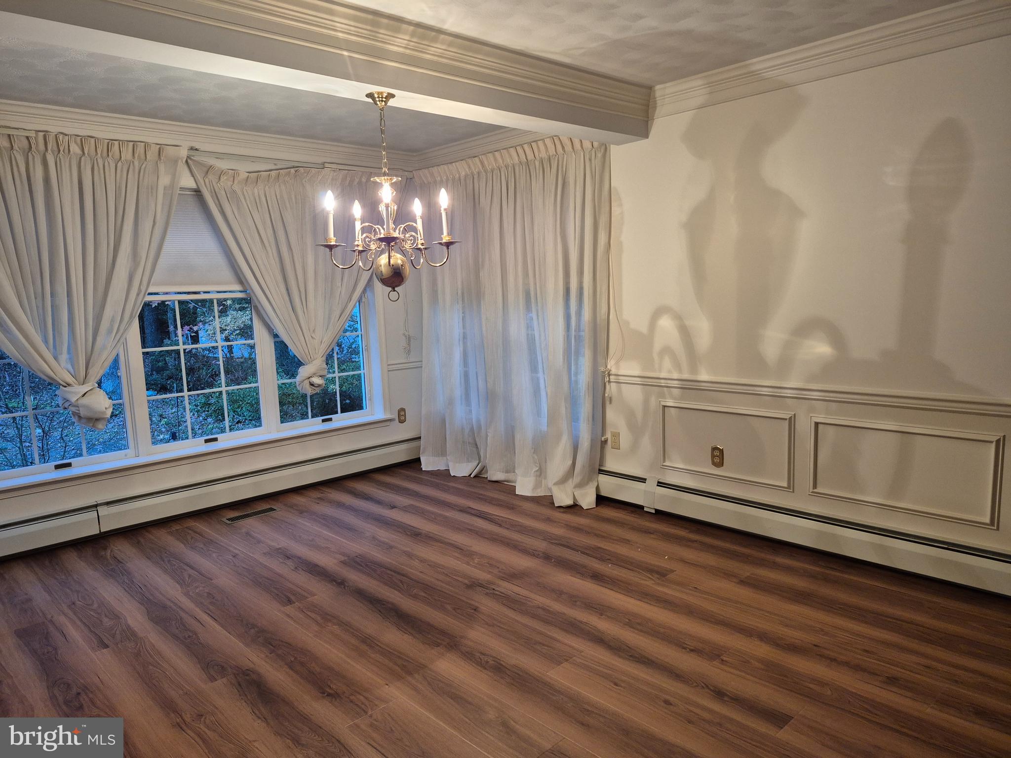 3896 5 Friars Road Salisbury, MD 21804 - Photo 7 of 60 a view of a room with wooden floor and windows