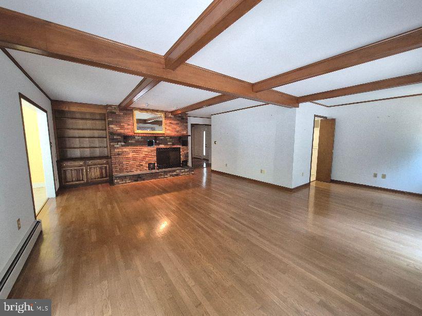 3896 5 Friars Road Salisbury, MD 21804 - Photo 9 of 60 Hardwood floors & solid beams in family room