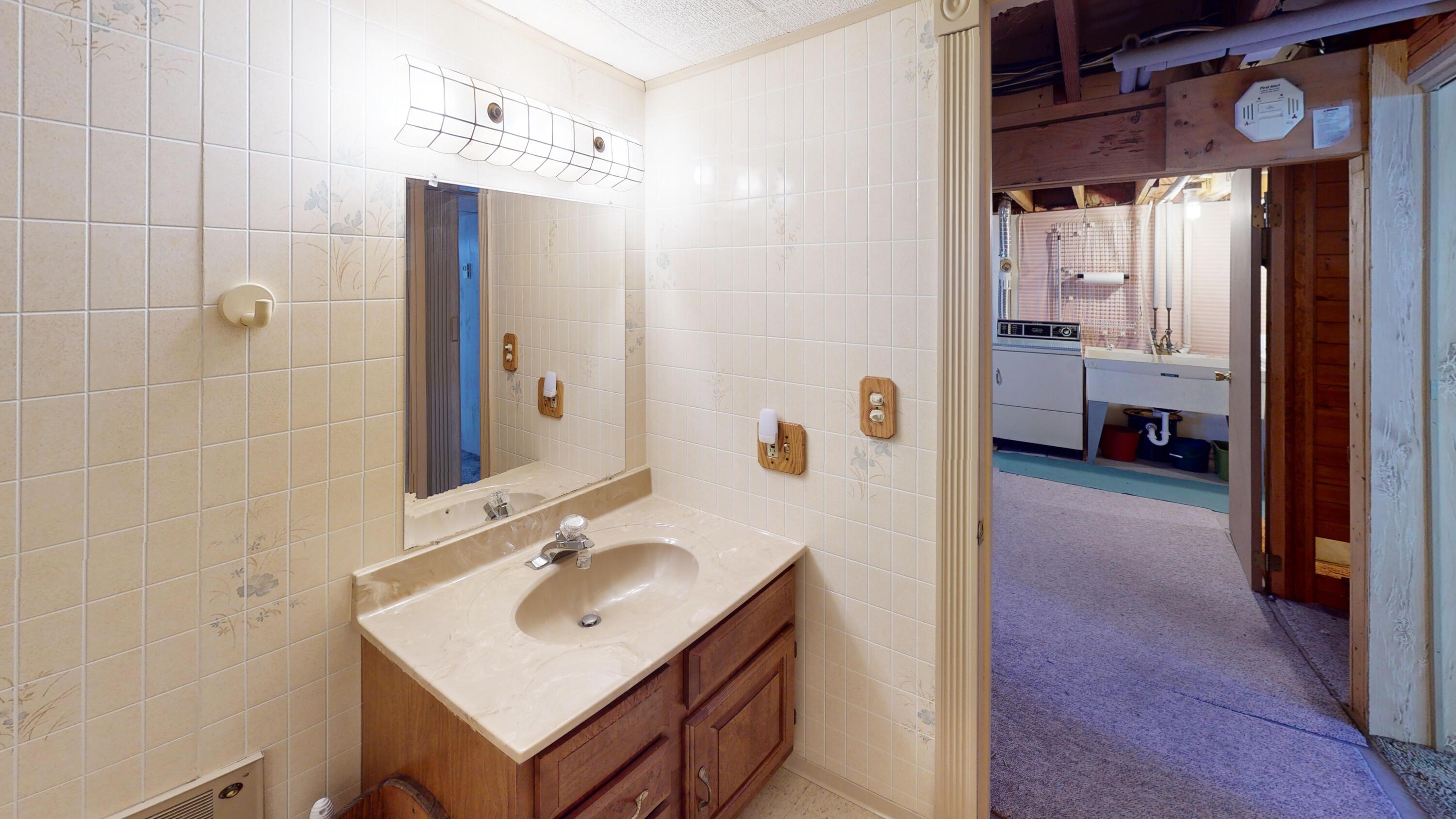 9055 Chub Lake Ridge Road Gaylord, MI 49735 - Photo 38 of 52 9055-Chub-Lake-Ridge-Rd-Bathroom 1