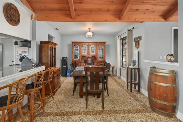 a view of a dining room with furniture