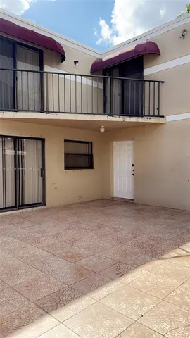a view of a room with a chandelier