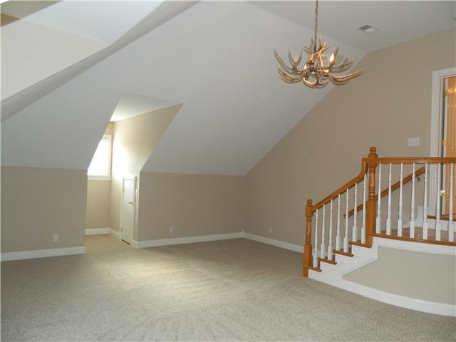 3207 Pugh Road Hermitage, TN 37076 - Photo 11 of 20 Recreational Room: 16 x 23 Located on the upper level and featuring a vaulted ceiling and raised windows, this room not only offers a spacious design, but also offers a raised platform area, recessed lighting and storage area.