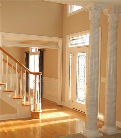 3207 Pugh Road Hermitage, TN 37076 - Photo 10 of 20 Entry Foyer: Inviting hardwood entry with soaring ceiling that opens to the upper level landing, leaded glass entry door with sidelights and transoms above, accented by a large palladium window.
