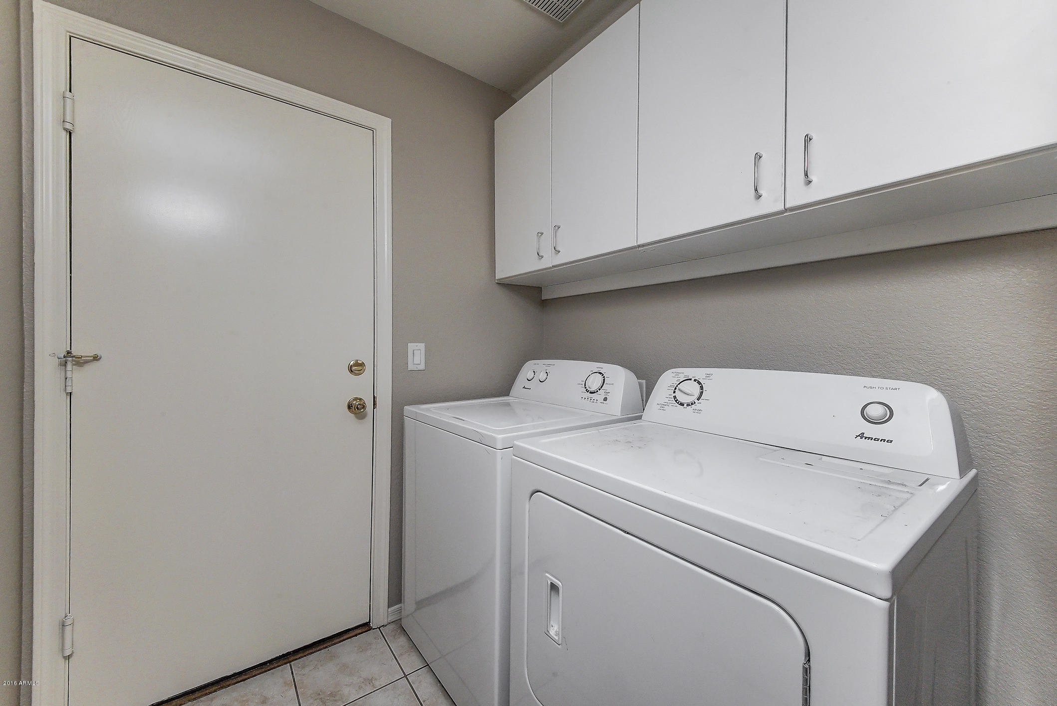 4016 East Ironhorse Road Gilbert, AZ 85297 - Photo 18 of 48 a utility room with dryer and washer