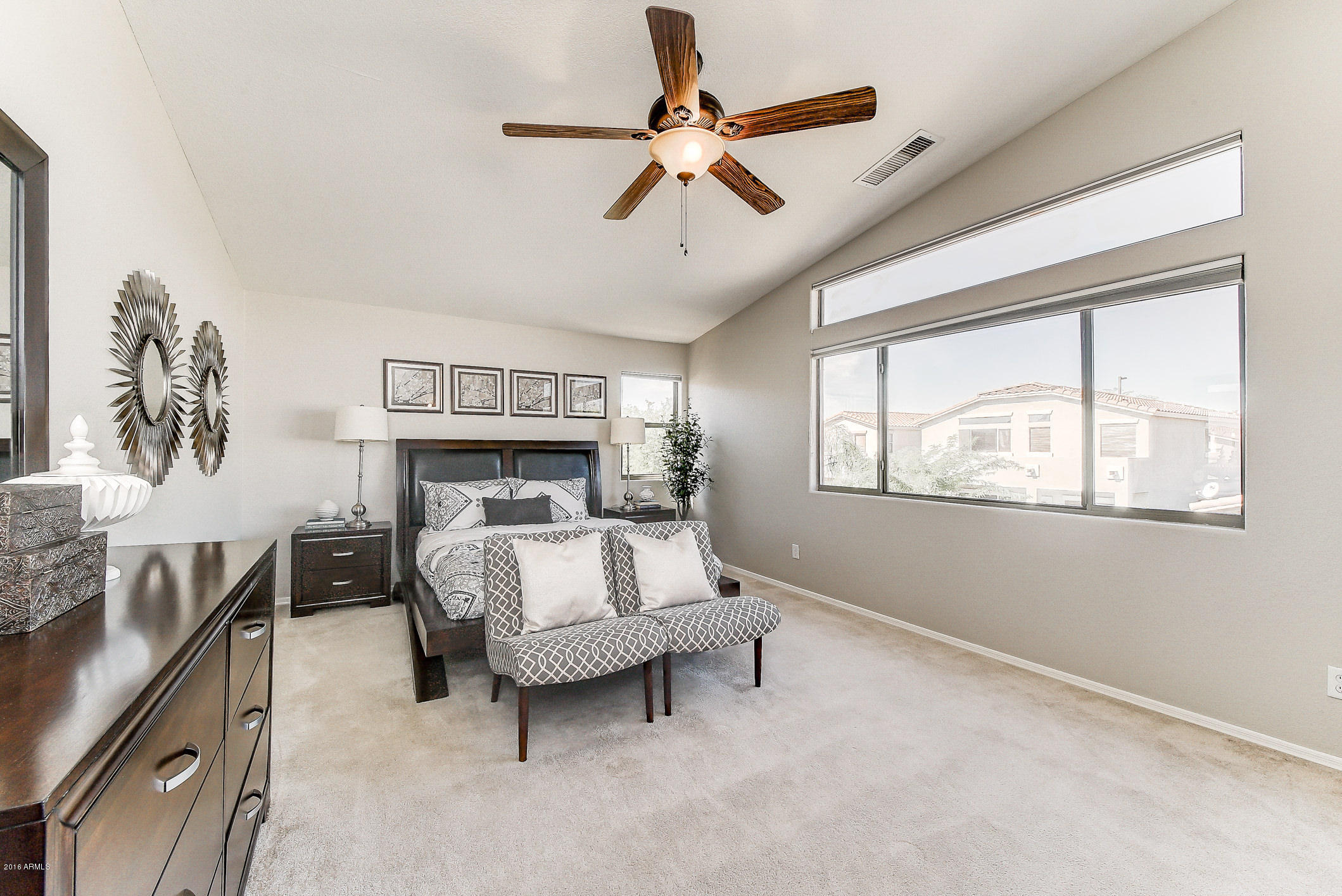 4016 East Ironhorse Road Gilbert, AZ 85297 - Photo 27 of 48 a bed room with furniture and a window