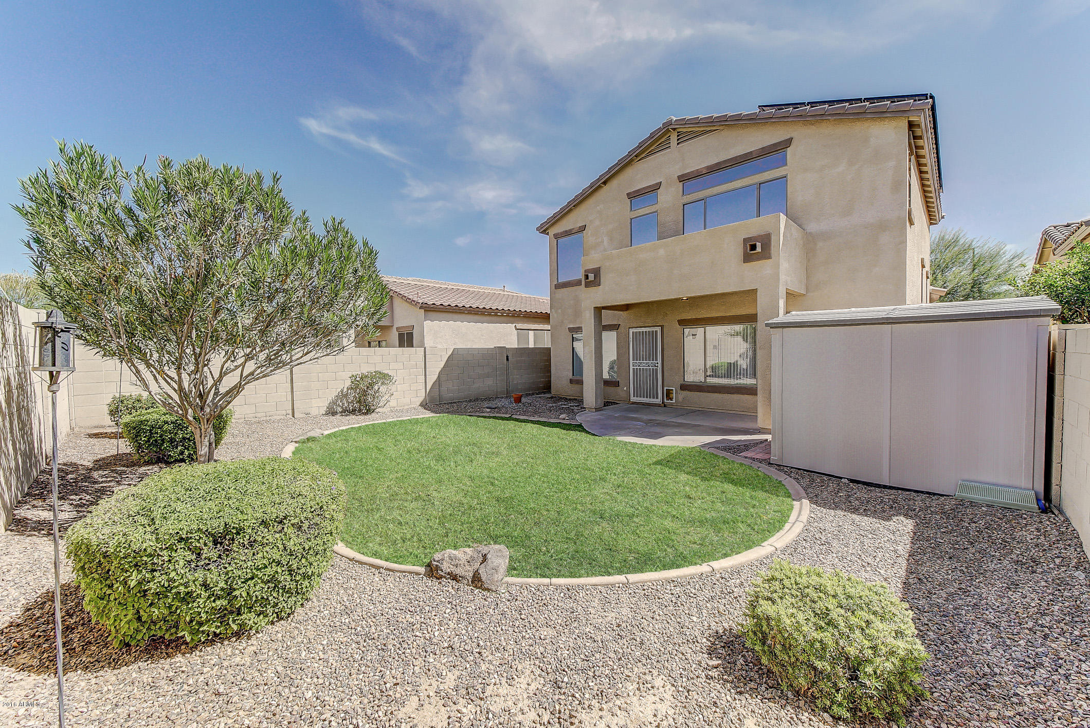 4016 East Ironhorse Road Gilbert, AZ 85297 - Photo 35 of 48 a view of a house with a backyard