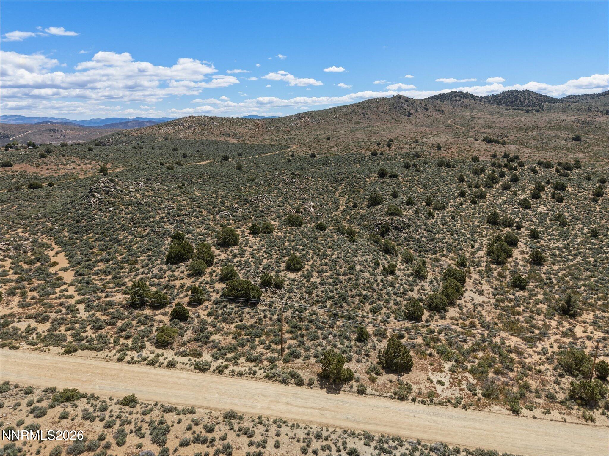 1325 Antelope Valley Road Reno, NV 89506 - Photo 14 of 20 a view of a field with mountains in the background