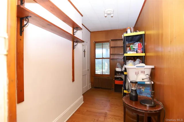 a view of hallway with windows