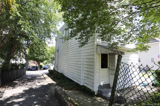 a view of a building with a door and a fireplace