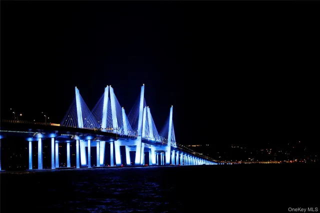 a view of outdoor space with sign board and garden