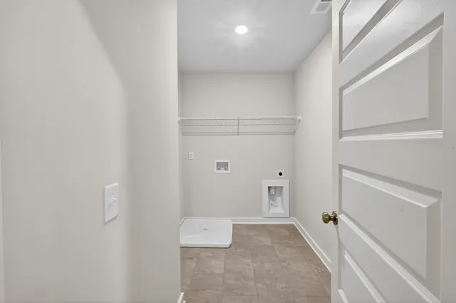 a bathroom with a sink toilet and a mirror