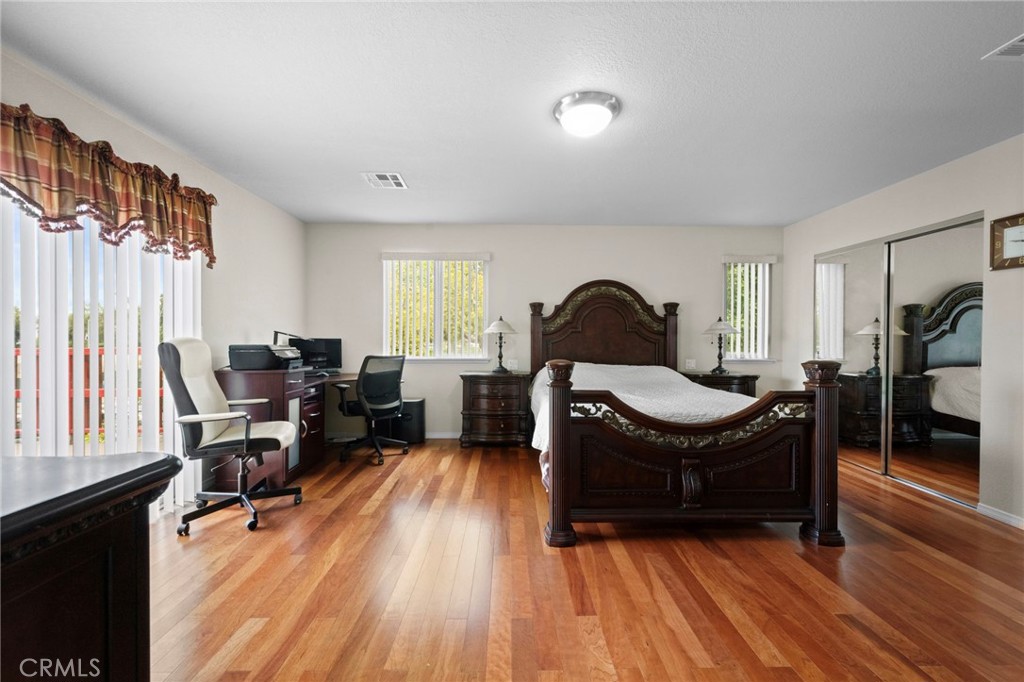 605 Bronco Way Walnut, CA 91789 - Photo 36 of 69 a living room with furniture and a wooden floor