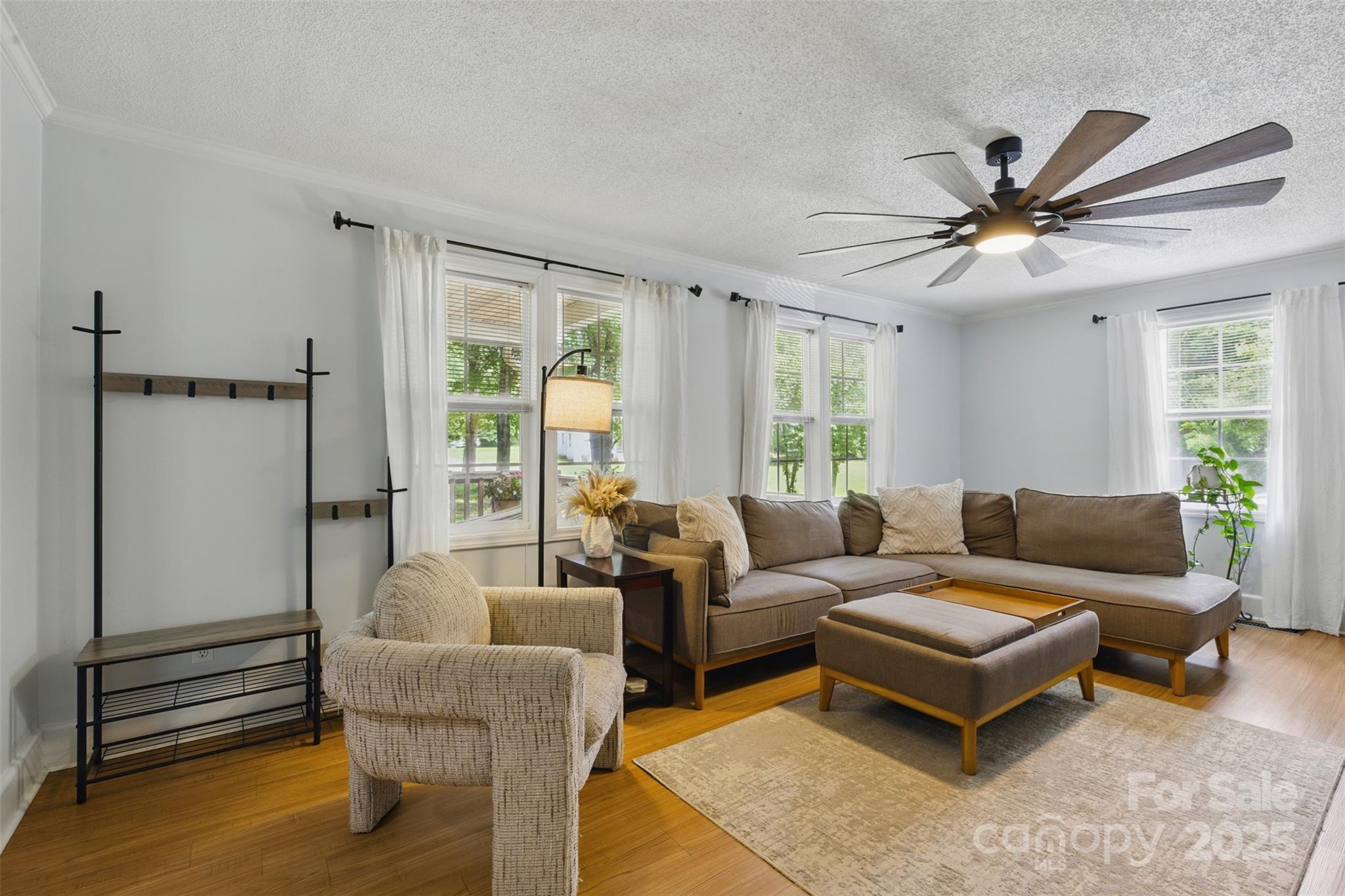 4230 Train Chaser Place Fort Mill, SC 29707 - Photo 1 of 31 a living room with furniture and a large window