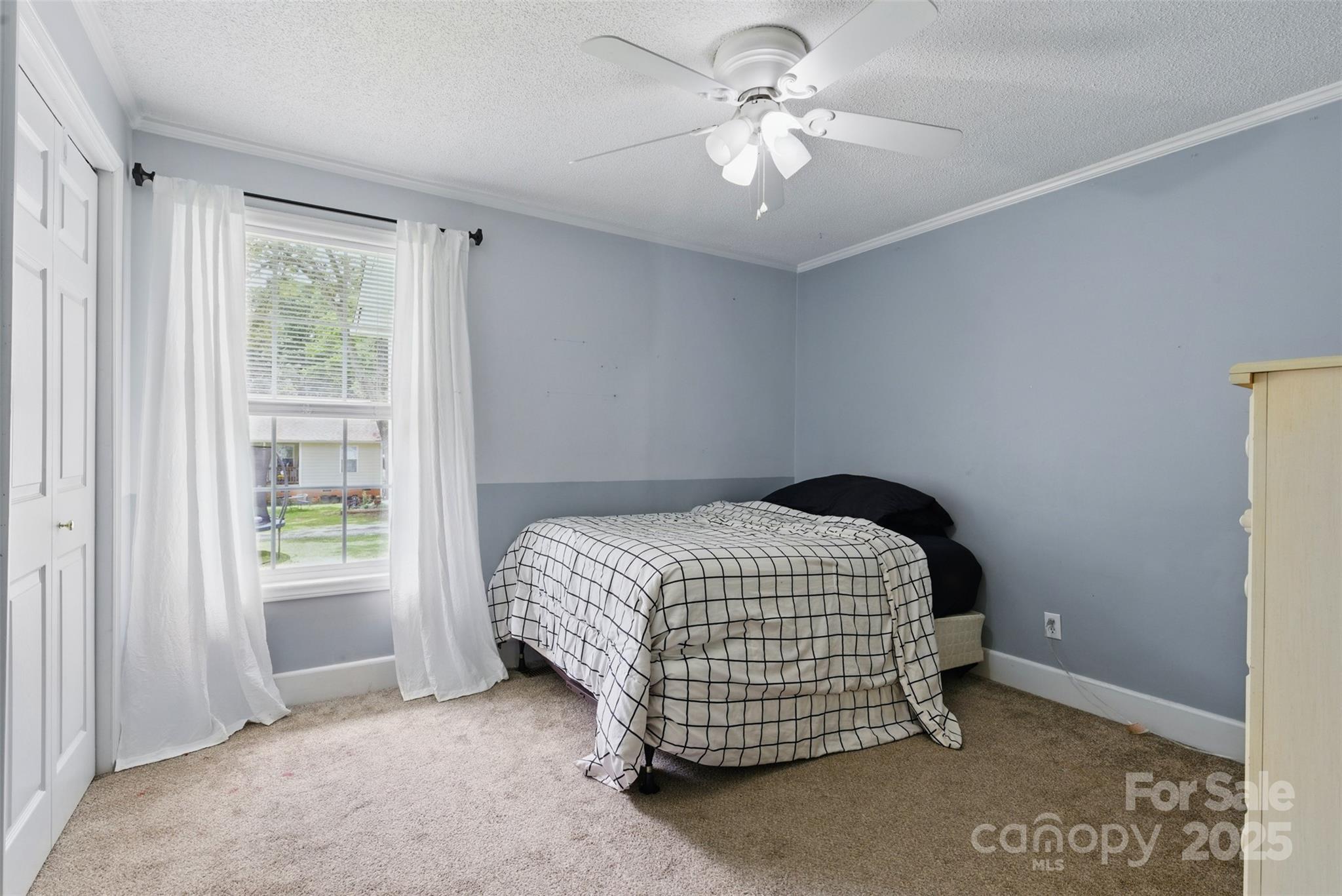 4230 Train Chaser Place Fort Mill, SC 29707 - Photo 11 of 31 a bedroom with a bed and a window