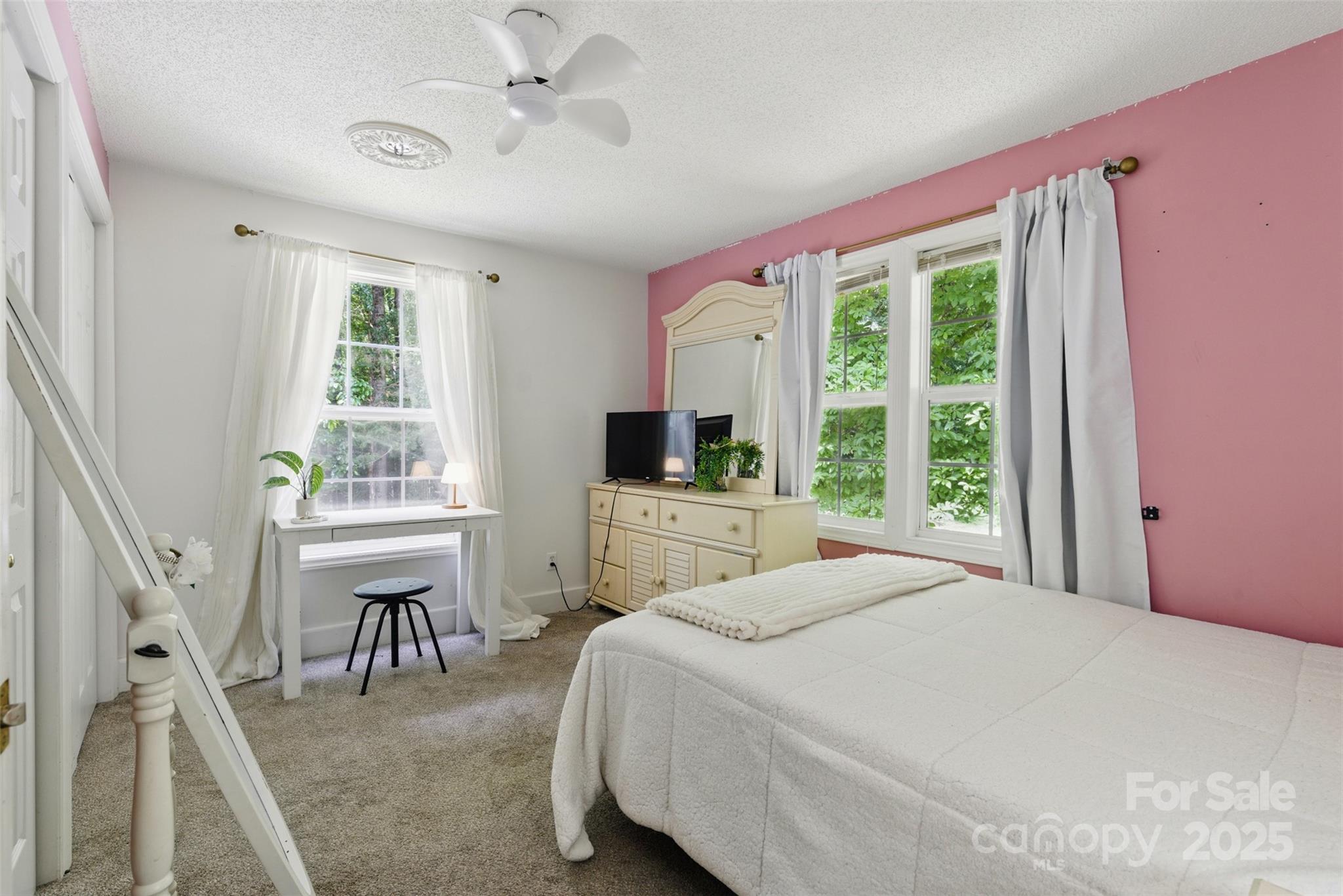 4230 Train Chaser Place Fort Mill, SC 29707 - Photo 14 of 31 a bedroom with a bed furniture and a window