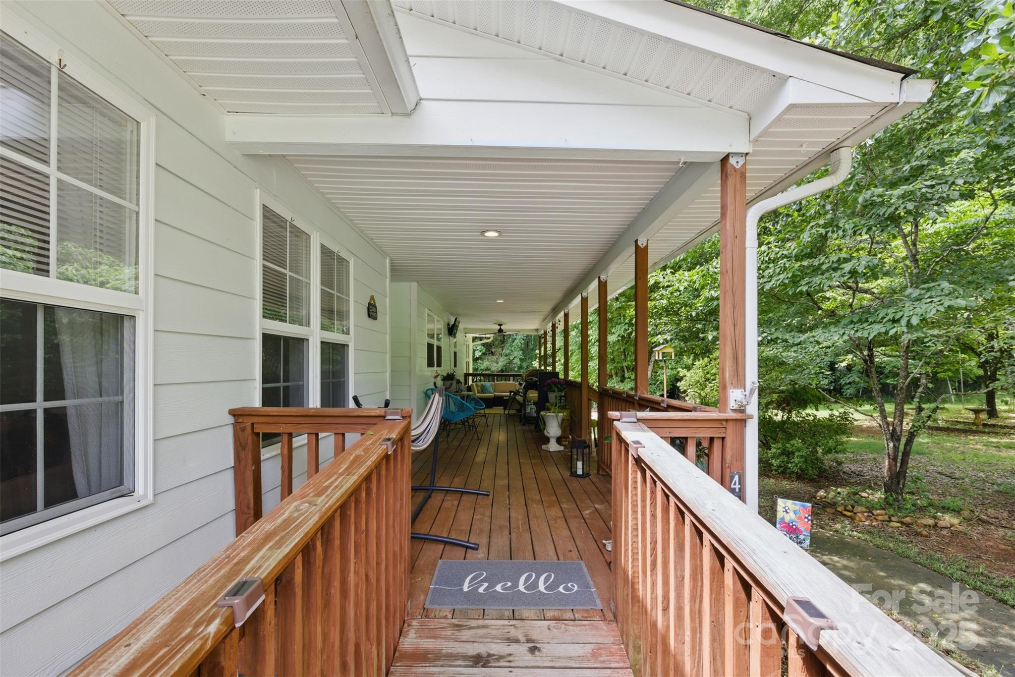 4230 Train Chaser Place Fort Mill, SC 29707 - Photo 24 of 31 a view of balcony with couch and wooden fence