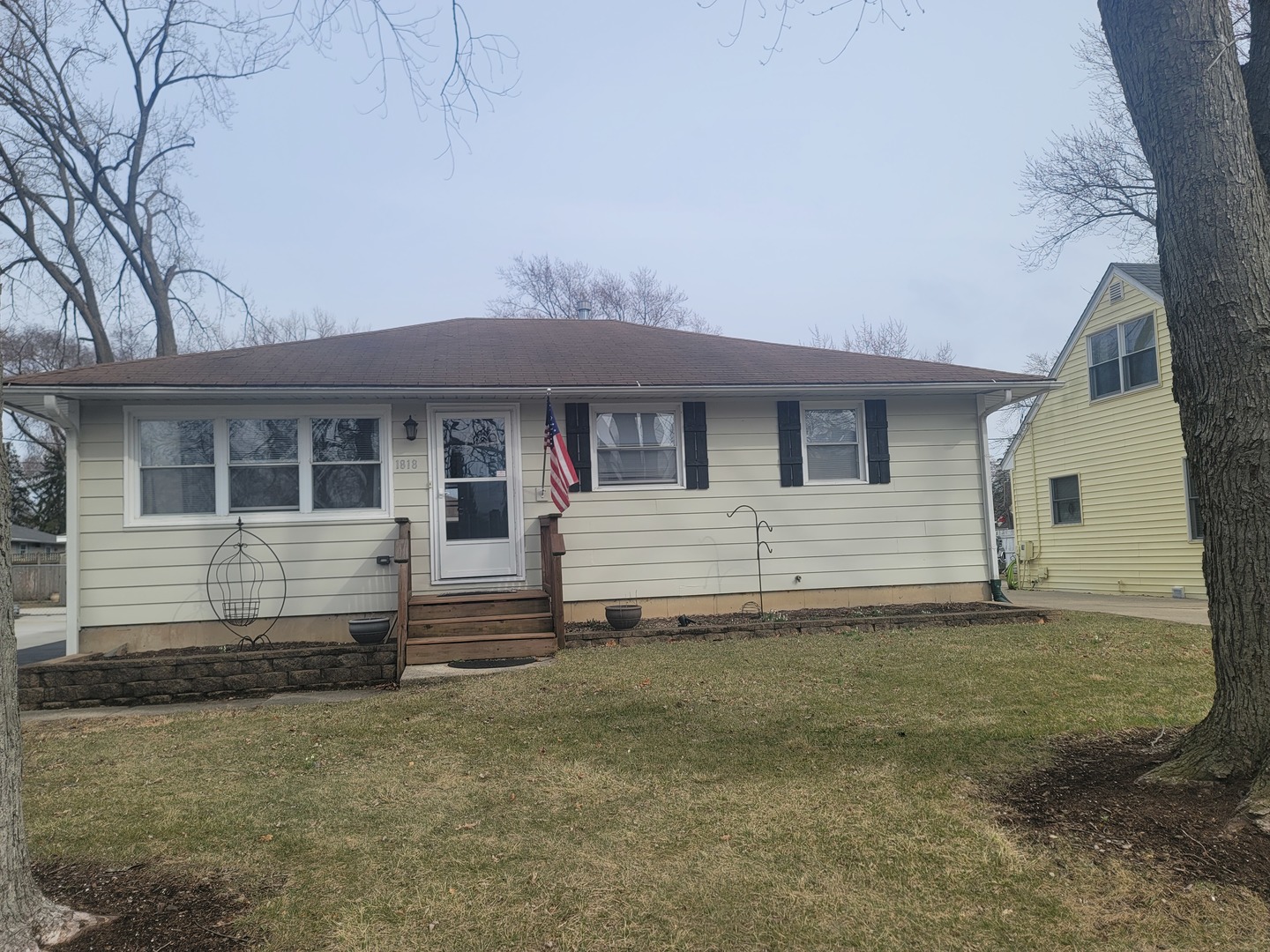 1818 South 4th Place St. Charles, IL 60174 - Photo 1 of 9 a front view of a house with a yard