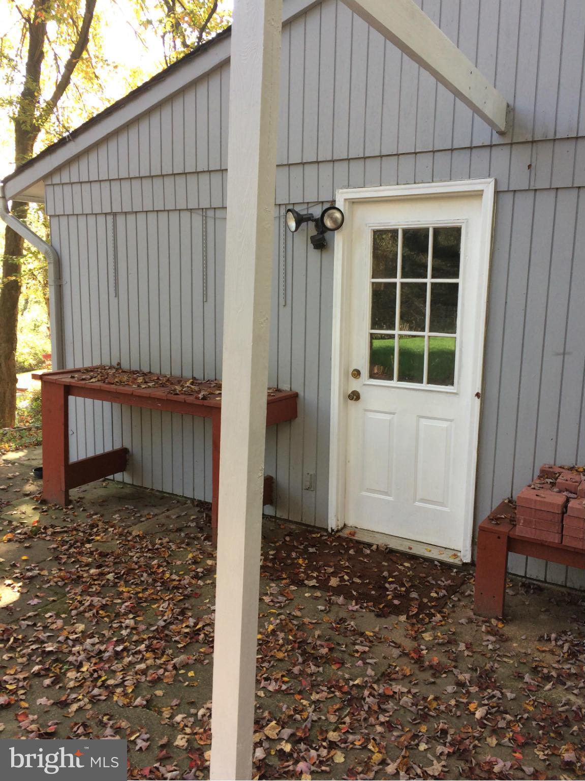 14305 Sturtevant Road Silver Spring, MD 20905 - Photo 25 of 28 GARAGE SIDE ENTRANCE