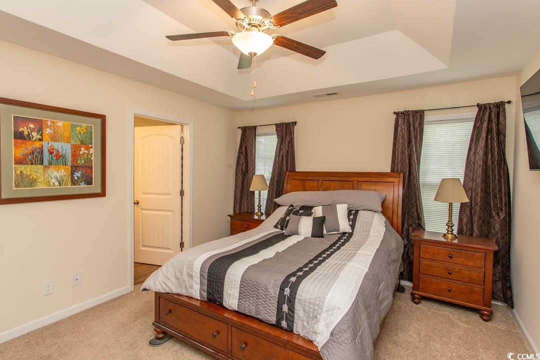 125 St Barnabus Road Loris, SC 29569 - Photo 19 of 39 Carpeted bedroom featuring ceiling fan and a raise
