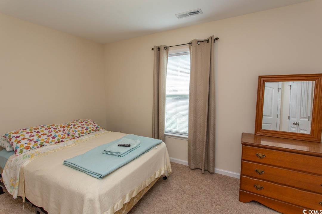 125 St Barnabus Road Loris, SC 29569 - Photo 27 of 39 Bedroom with light carpet